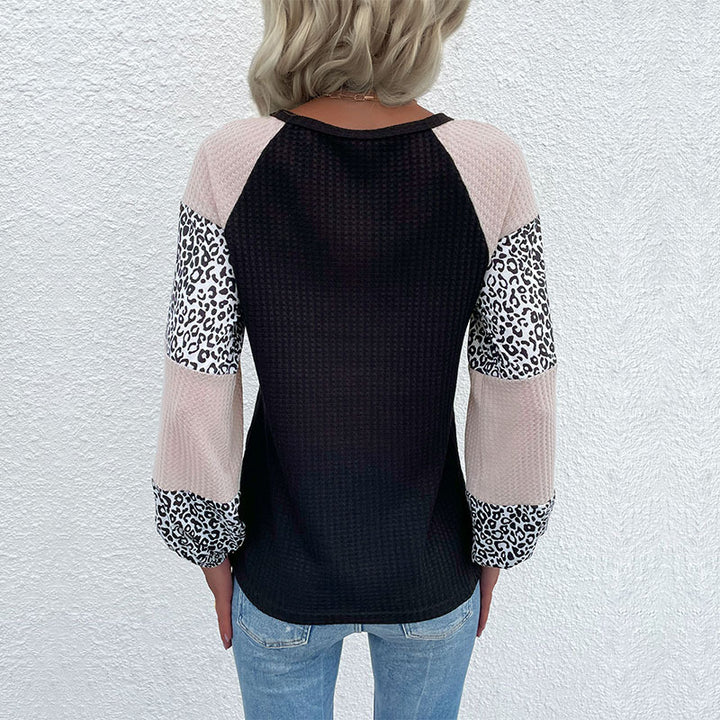 Top à la mode pour femmes avec imprimé animal et élégantes manches bouffantes Chic & Stil