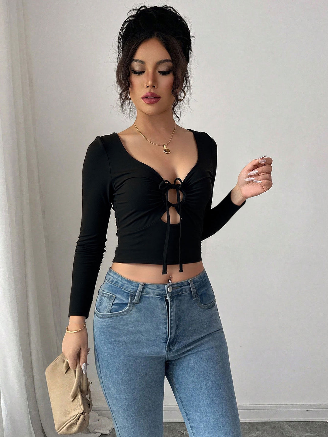 Haut court femme avec nœud décoratif et manches longues Chic & Stil