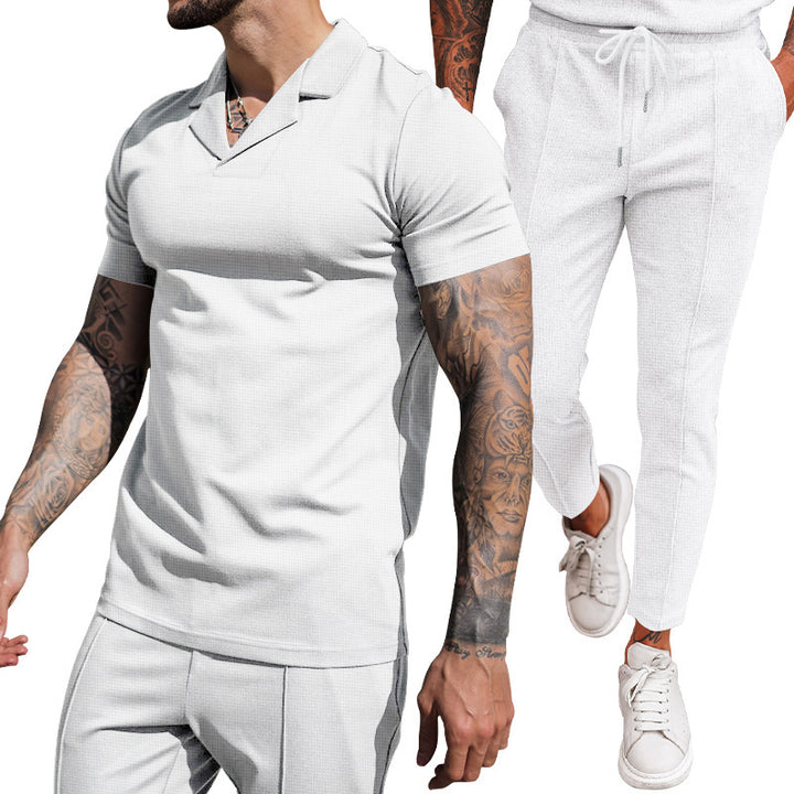 Elegant men's short sleeve polo with textured design and matching slim-fit trousers Lune London