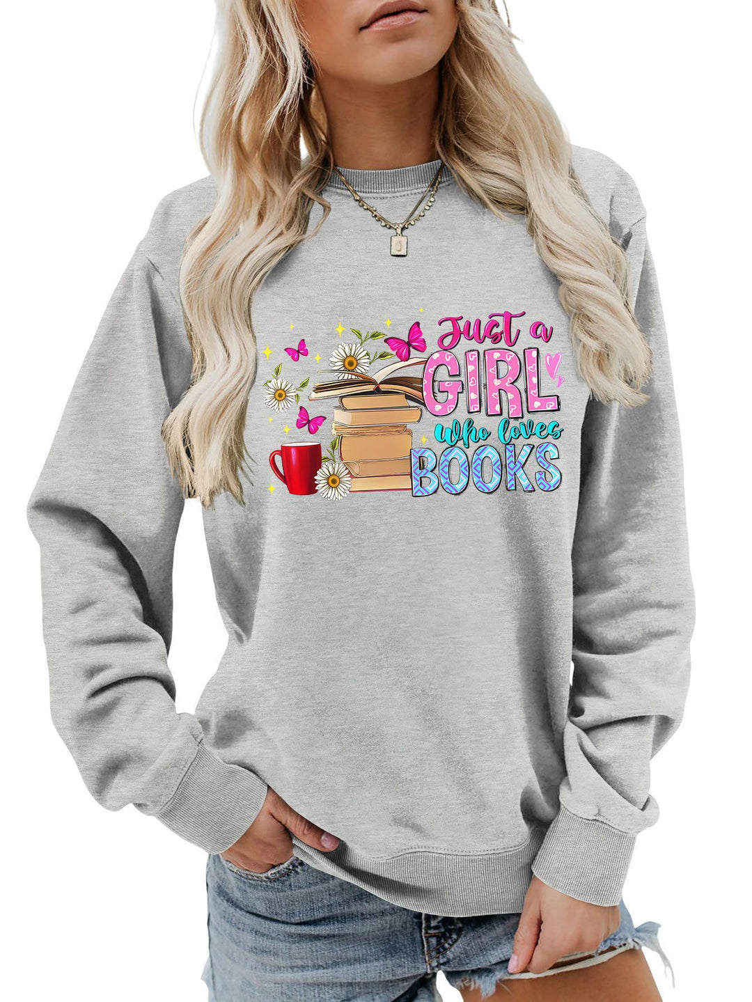 Sweat-shirt féminin avec motif de livre accrocheur et coupe décontractée Chic & Stil
