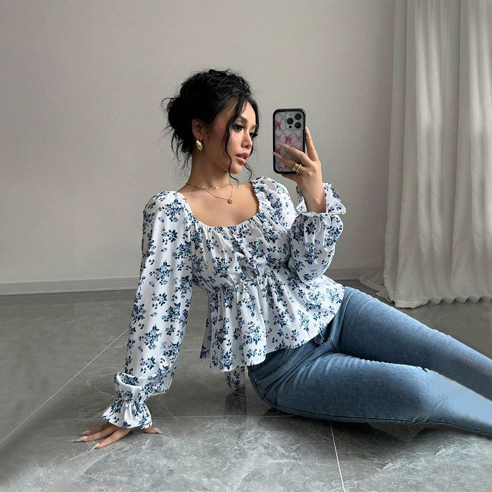 Women's blouse with floral design and voluminous sleeves Chic & Stil