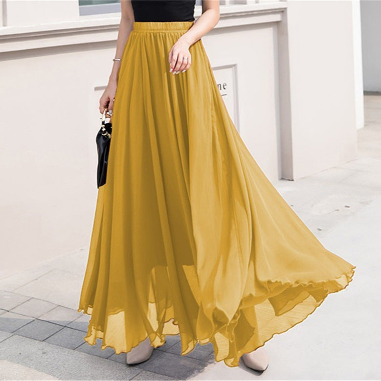 Long and flowing skirt for women with elastic waist and floating hem Lune London