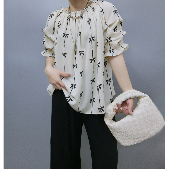 Blouse for women with ruffled sleeves and bow pattern Lune London