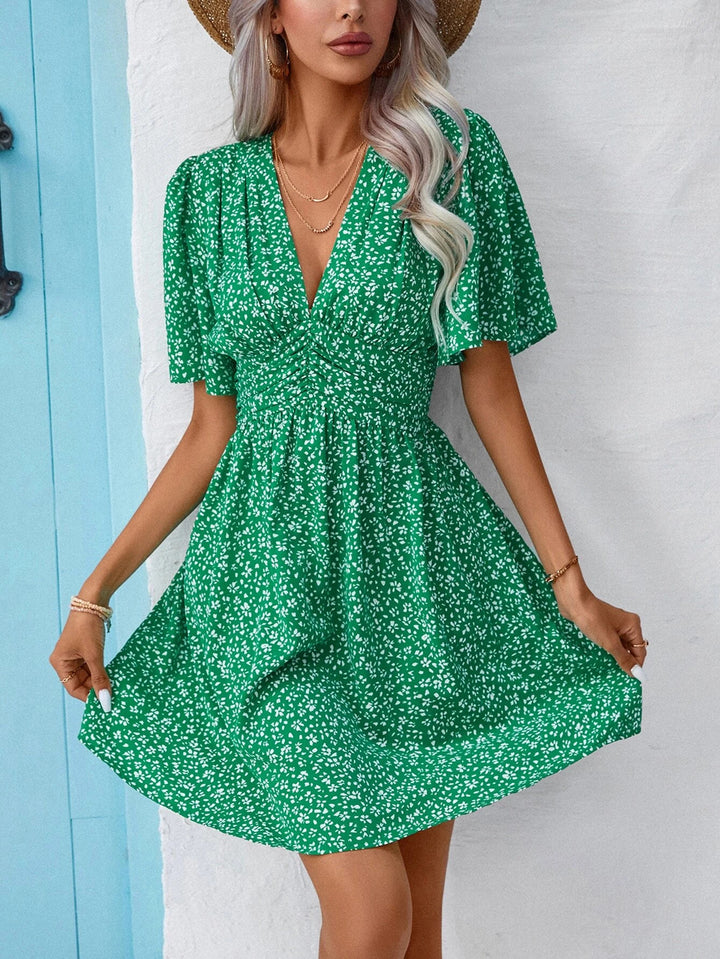 V-neck dress with snowflake pattern for women with puff sleeves and elastic belt Lune London