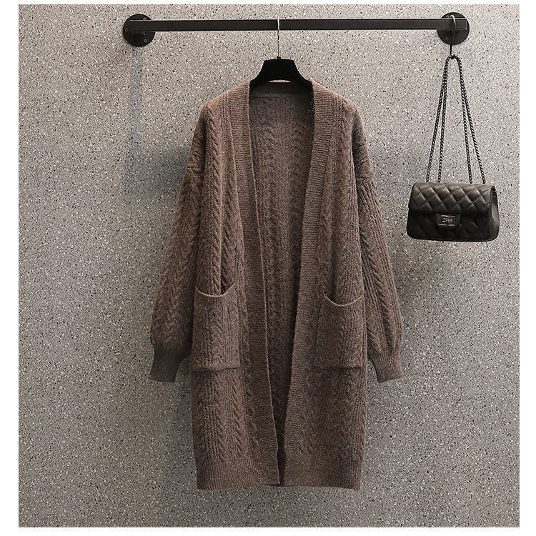 Ladies Thick Knit Cardigan with deep pockets and elegant Braid design Lune London