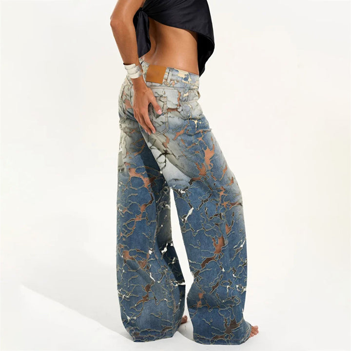 Ladies Flared denim pants with unique distressed details Lune London