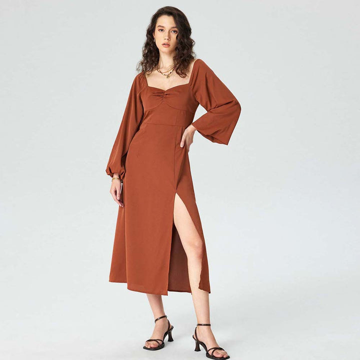 Robe midi pour femmes avec des manches bouffantes raffinées et une haute fente Chic & Stil