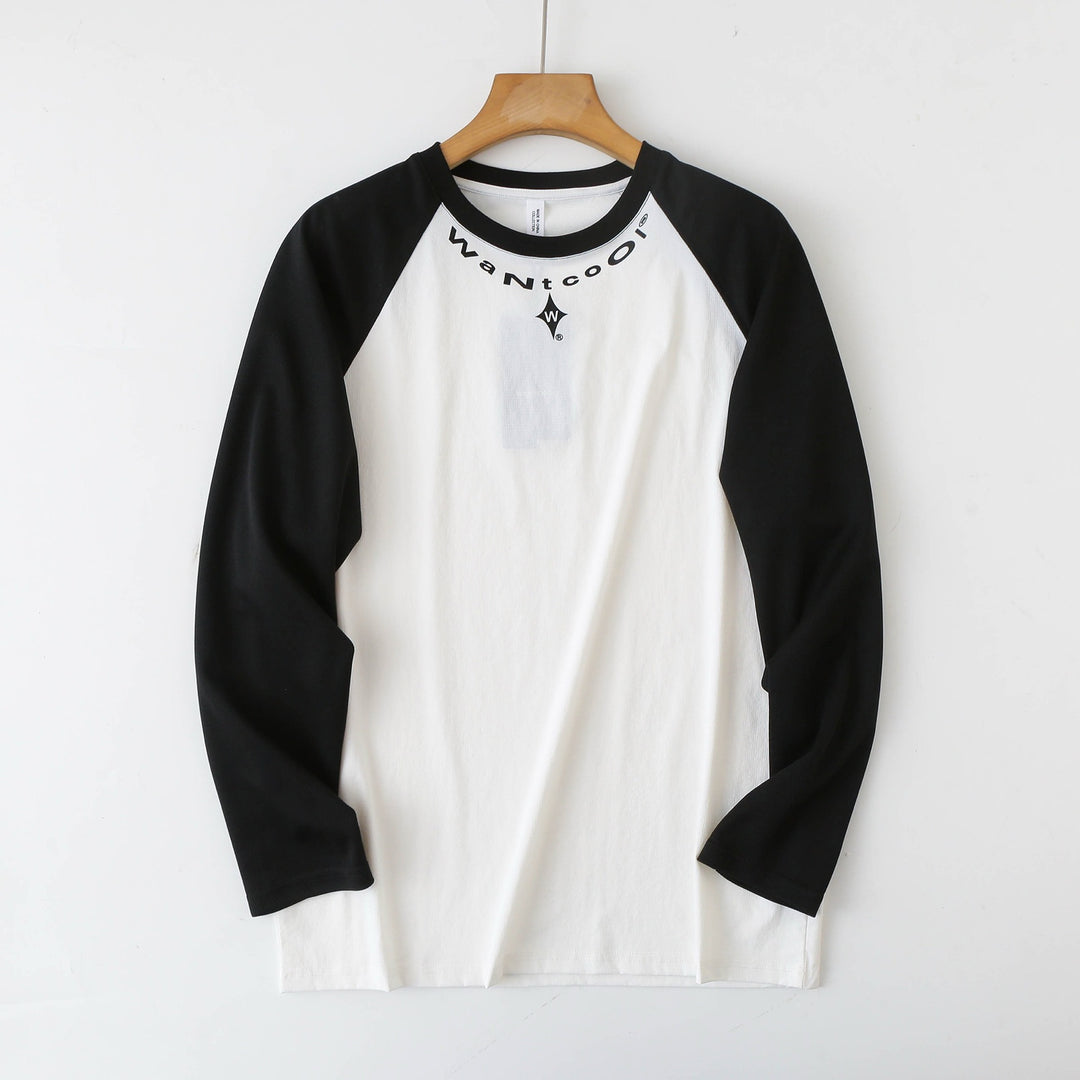 Chemise longue à manches longues sportive pour femmes avec construction innovante de manches raglan Chic & Stil
