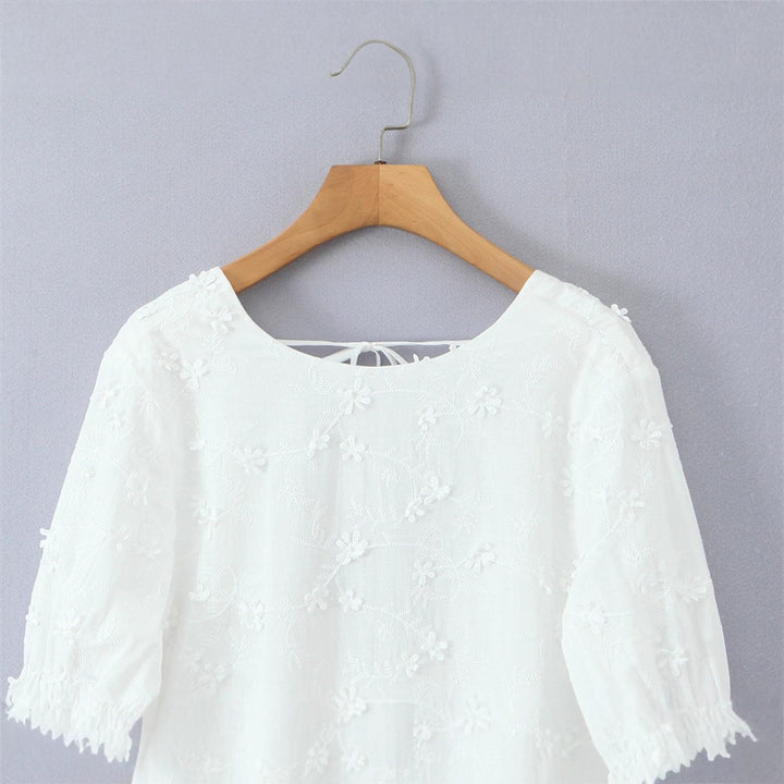 Airy blouse dress for women with floral embroidery and ruffled sleeves Lune London