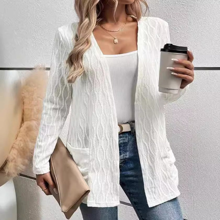 Women's knitted jacket with a refined wave pattern and practical pockets Lune London