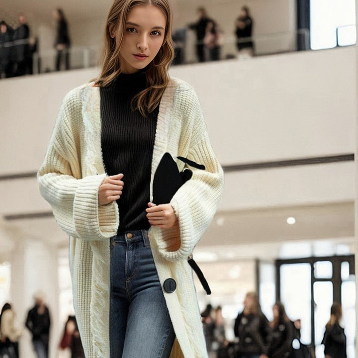 Chunky knit coat for women with fringes and elegant button closure Lune London