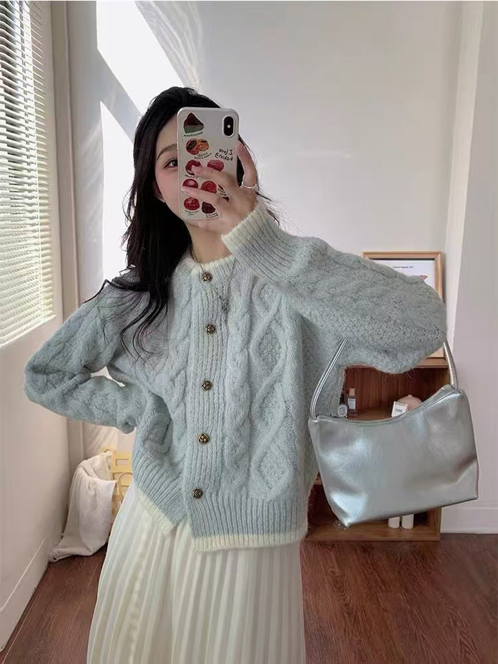 Thick knit women’s jacket with cable pattern and decorative buttons Lune London