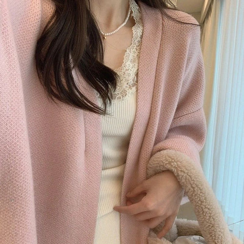 Manteau long en tricot pour femmes avec une coupe surdimensionnée et une doublure en polaire douce
