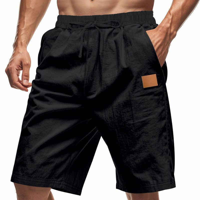 Casual men's sports shorts with elastic waistband and practical pockets Lune London
