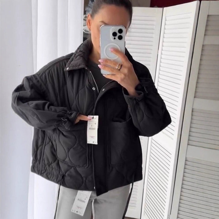 Quilted transitional jacket for women with high collar and drawstring Lune London