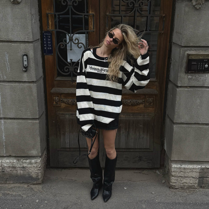 Oversized knitted sweater for women with modern stripe patterns and a Lune London logo application