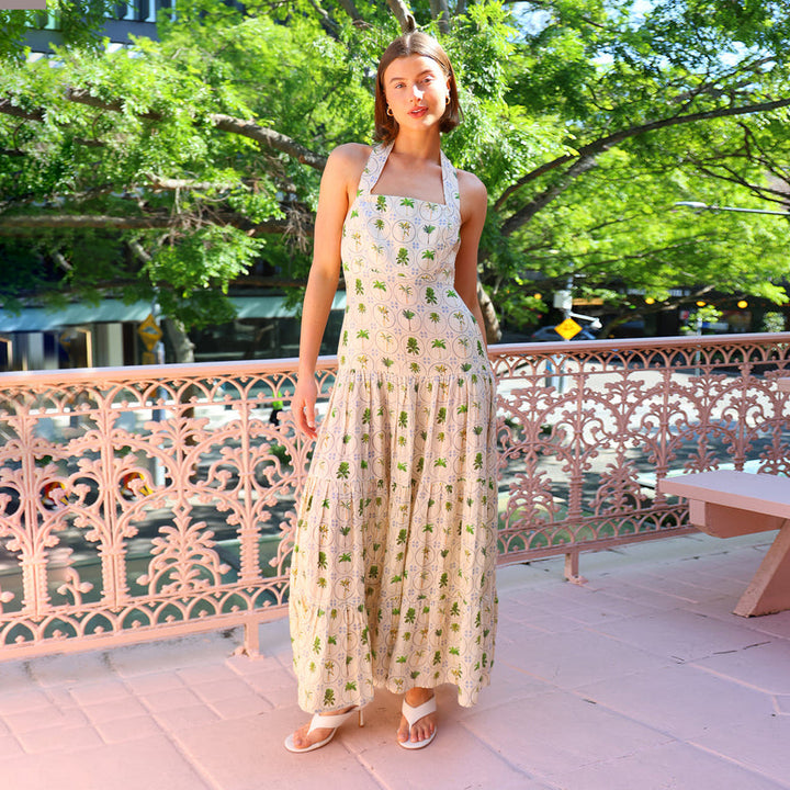 Women’s maxi dress with playful halterneck design and floral pattern mix Lune London