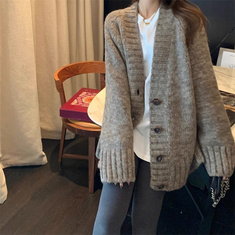 Ladies chunky knit cardigan with voluminous sleeves and buttoned neckline Lune London