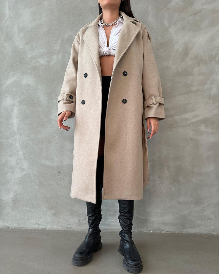 Stylish women's trench coat with elegant details and a double-breasted front closure Lune London