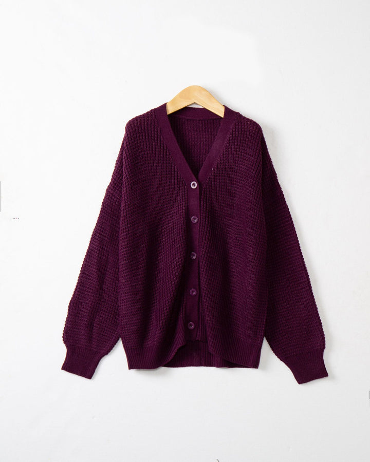 Women's knitted jacket with structured pattern and practical button details Lune London
