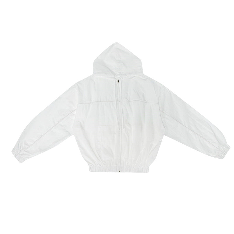 Veste coupe-vent légère pour femme avec capuche et poche kangourou Chic & Stil