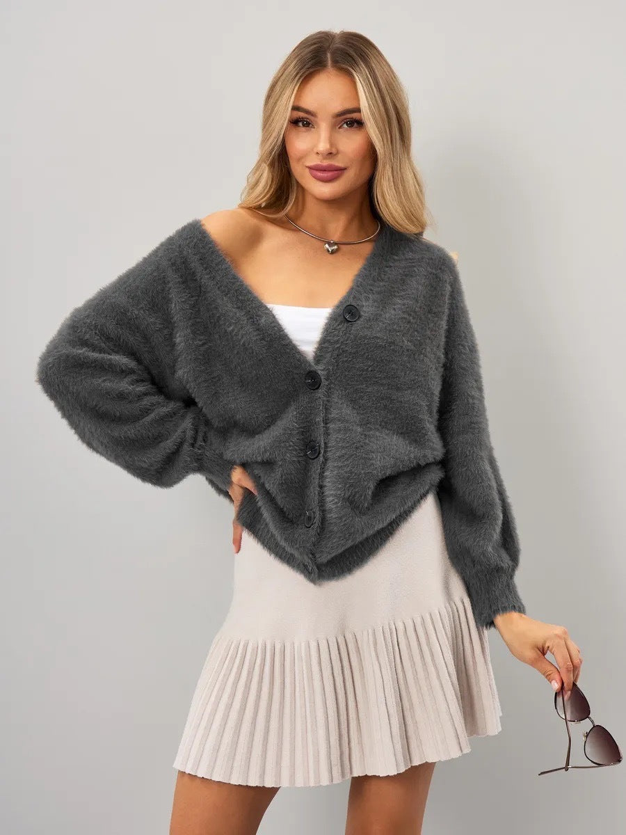 Cardigan confortable pour femmes avec coupe asymétrique et fermeture par bouton Chic & Stil