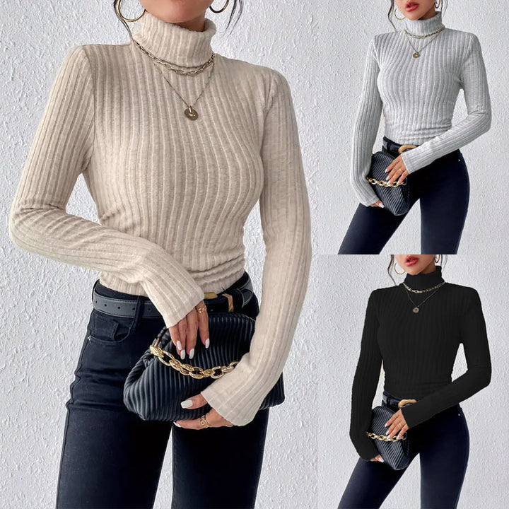 Ladies elegant ribbed knit top with high collar and longer cut Lune London