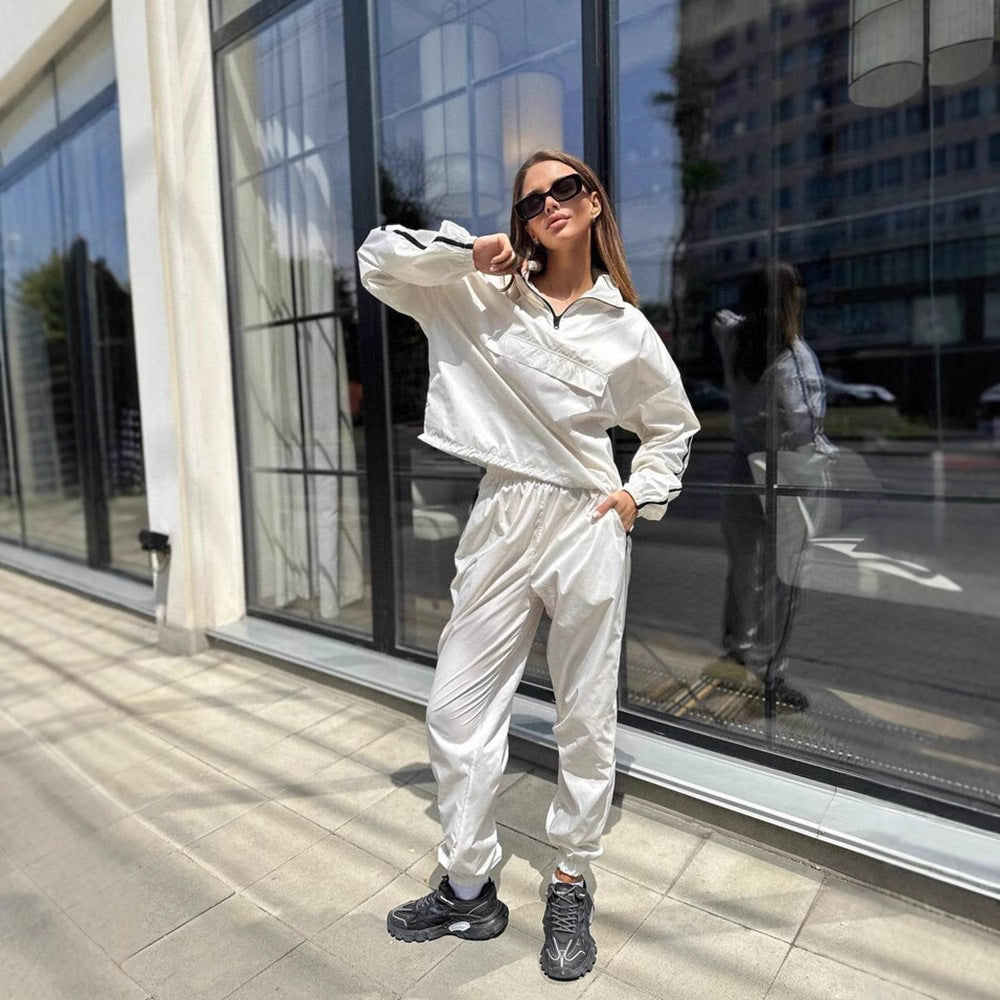Ladies functional sports suit with high collar and elastic cuffs Lune London