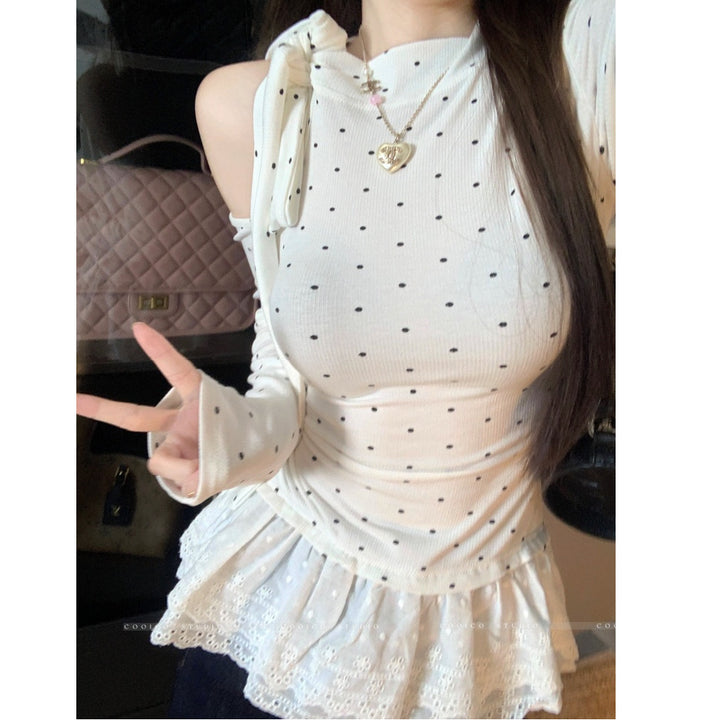 Women's asymmetric top with playful ruffle detail Chic & Stil