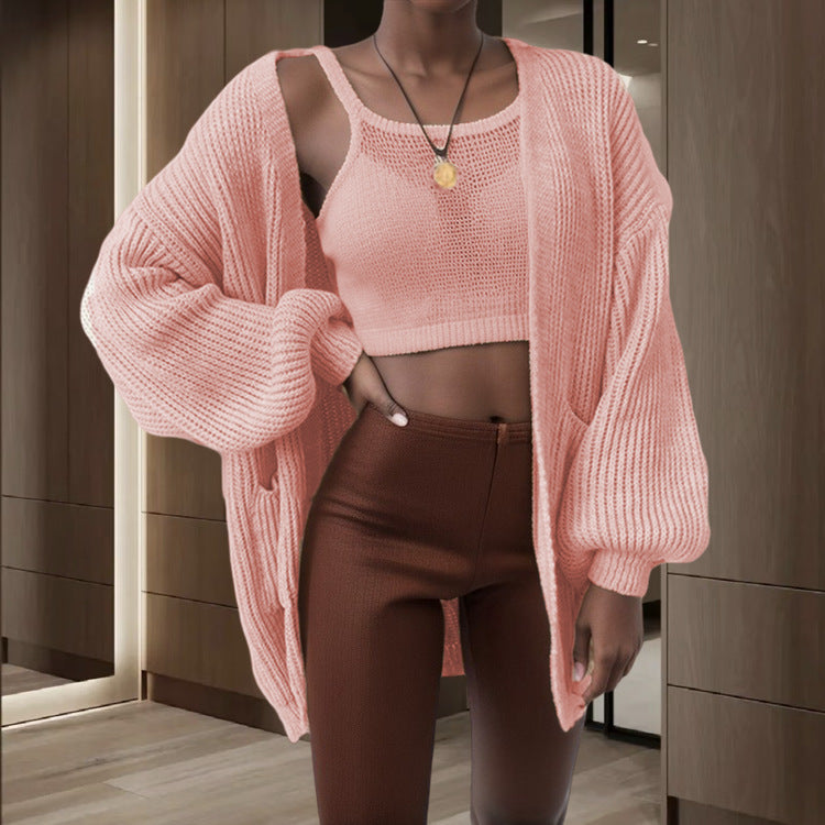 Cardigan pour femmes en tricot épais avec des manches volumineuses et des poches pratiques Chic & Stil