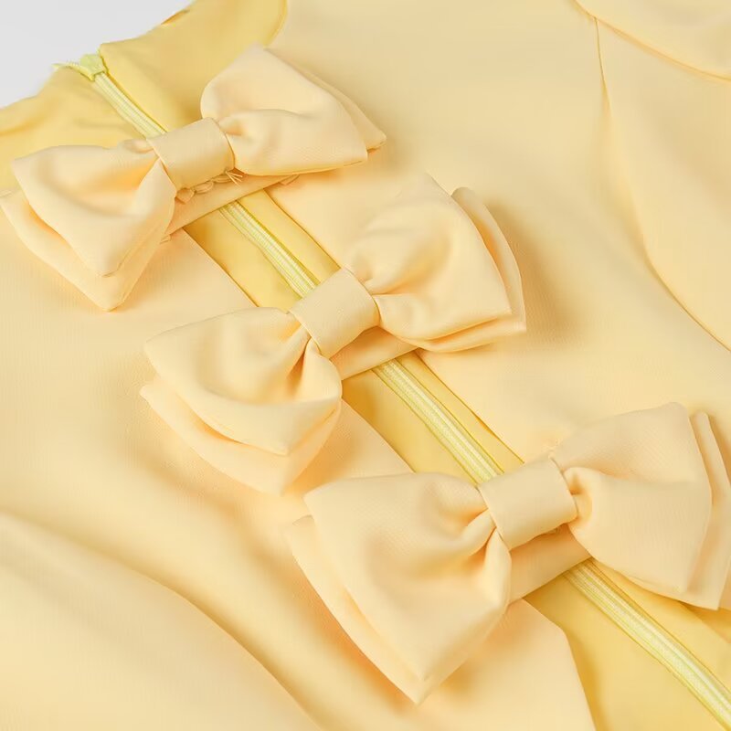 Dress for women with a fun ruffle design and elegant bow details Lune London