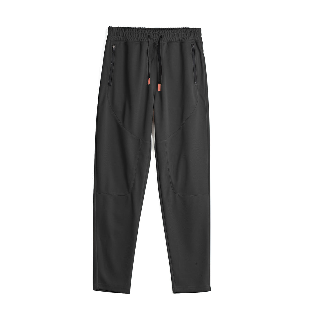 Men's sporty jogging pants with an innovative breathable structure and practical zippered pockets Lune London