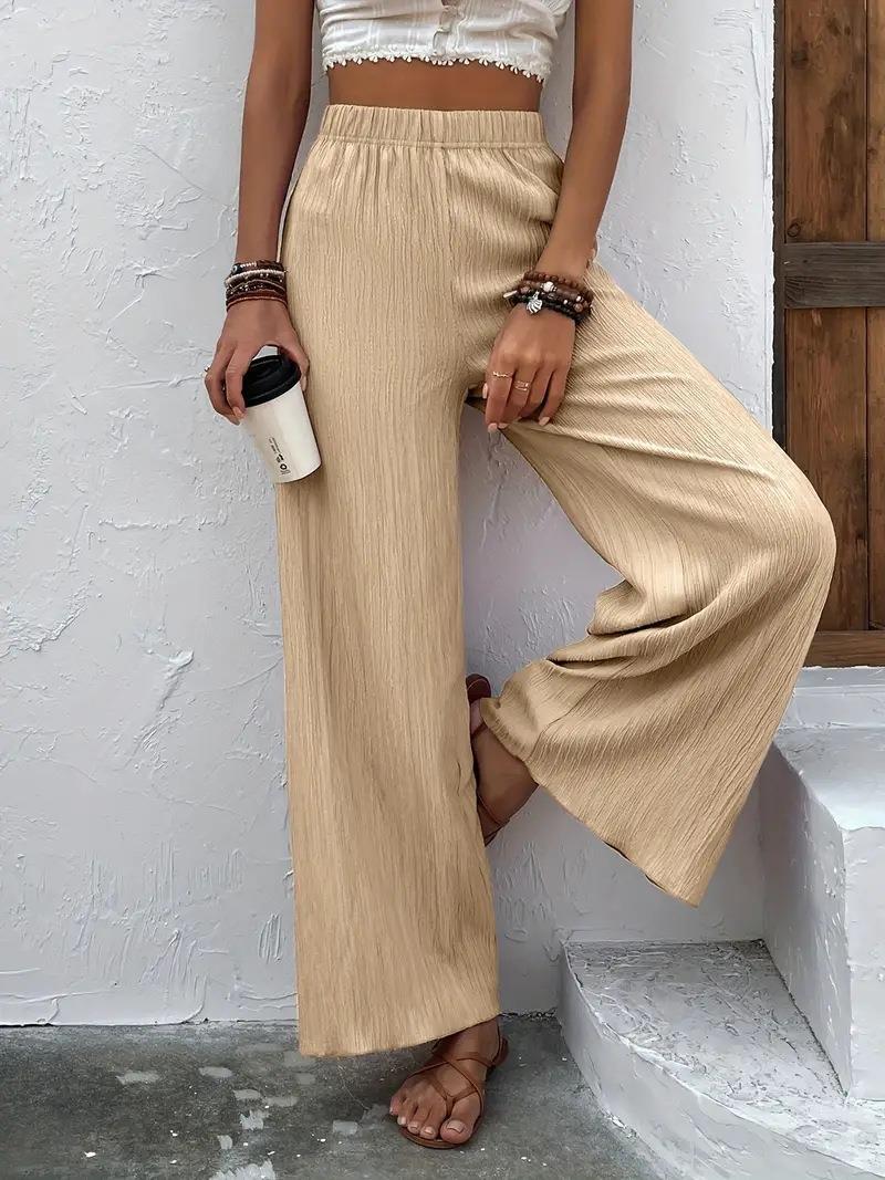 Wide pleated pants for women with elastic waist and elegant drape Lune London