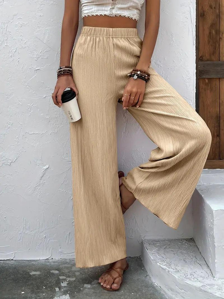 Wide pleated pants for women with elastic waist and elegant drape Lune London