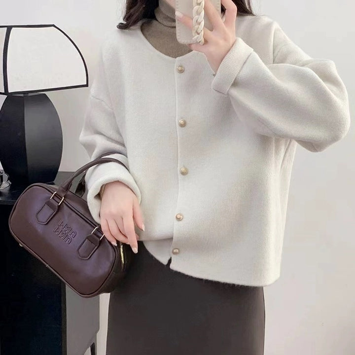 Women's chunky knit cardigan with elegant button placket and relaxed fit Lune London