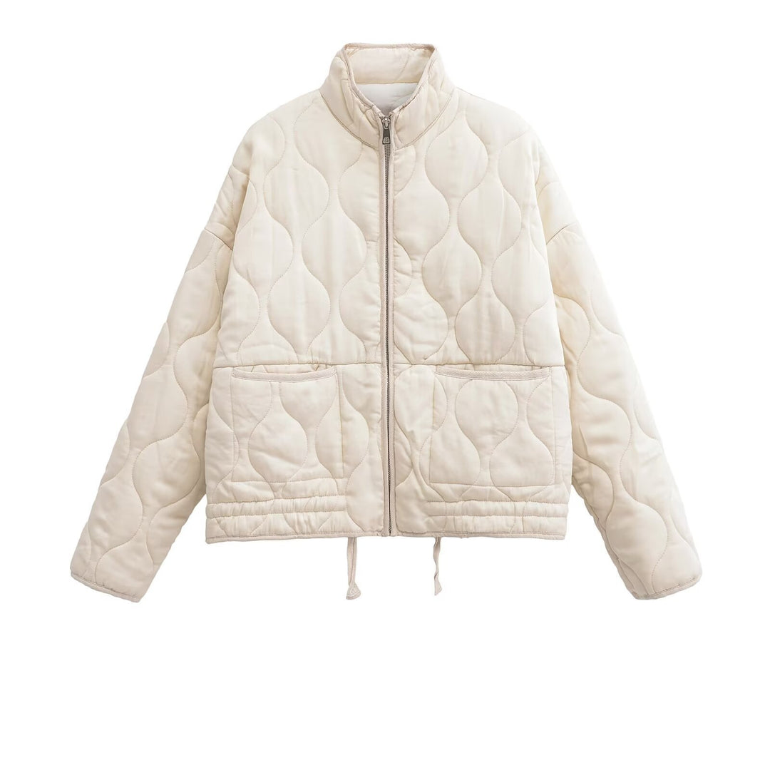 Ladies quilted transition jacket with high collar and practical pockets Lune London