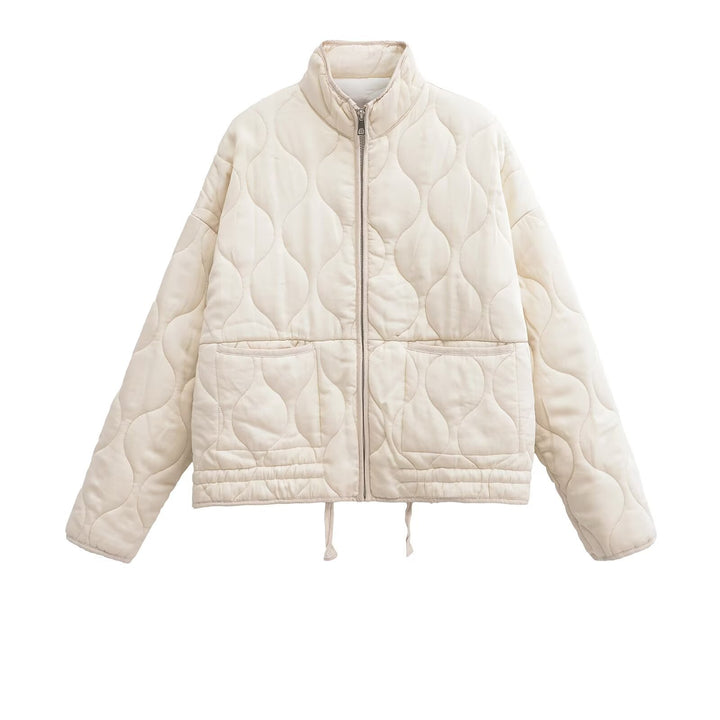 Ladies quilted transition jacket with high collar and practical pockets Lune London