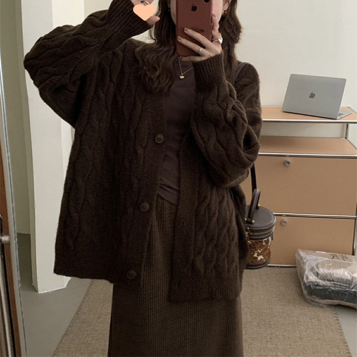 Ladies large knit cardigan with an elegant cable pattern and comfortable button details Lune London