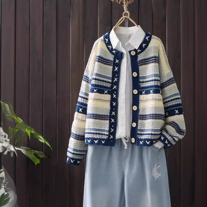 Ladies knitted patterned vest with decorative buttons and deep pockets Lune London