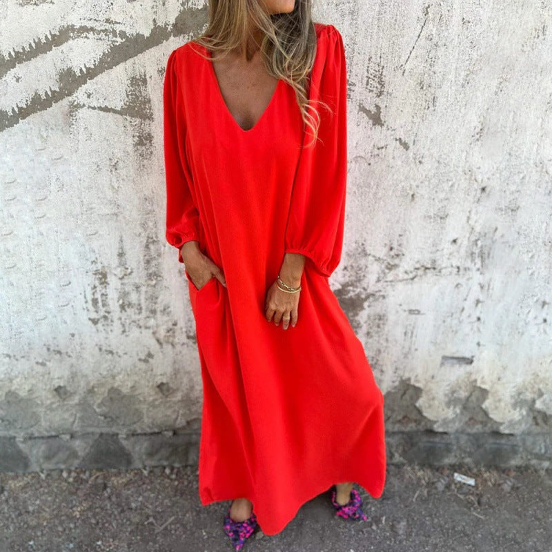 Maxi dress for women with deep V-neckline and practical side pockets Lune London