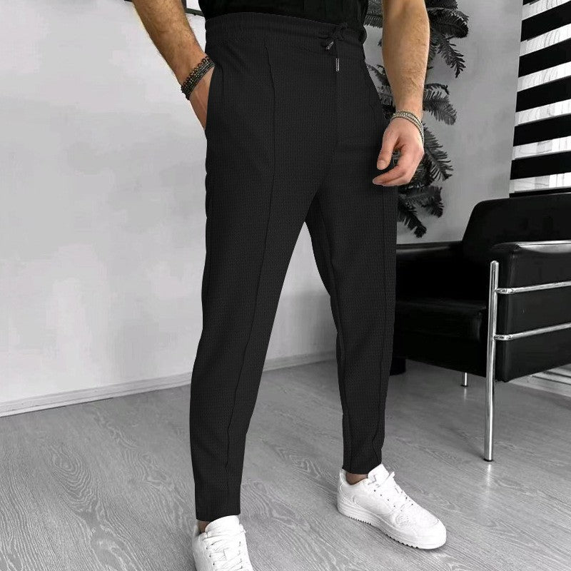 Luxury men's pants with elastic drawstring and textured design Lune London