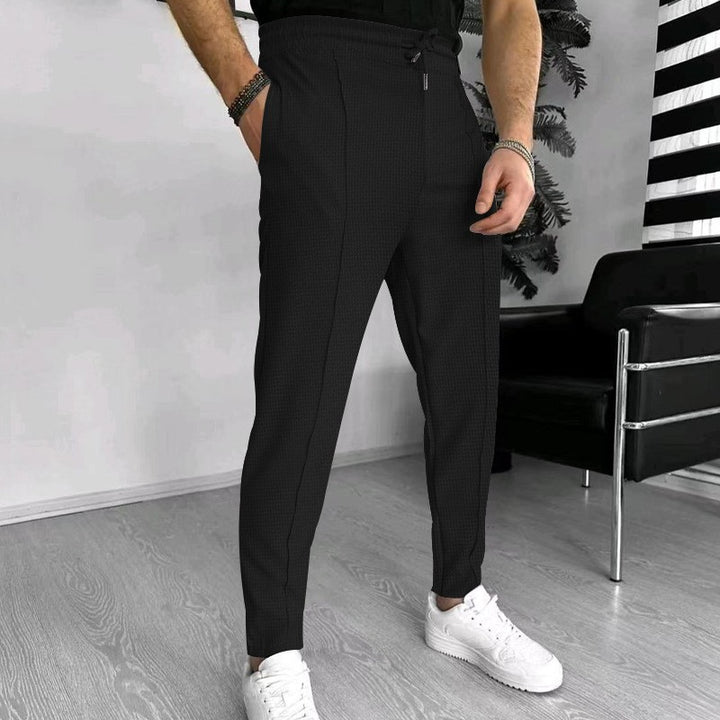 Luxury men's pants with elastic drawstring and textured design Lune London
