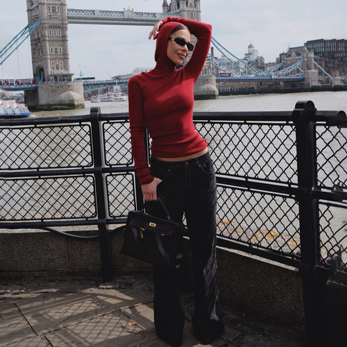 Women's fitted long sleeve top with high collar and thumb openings Lune London