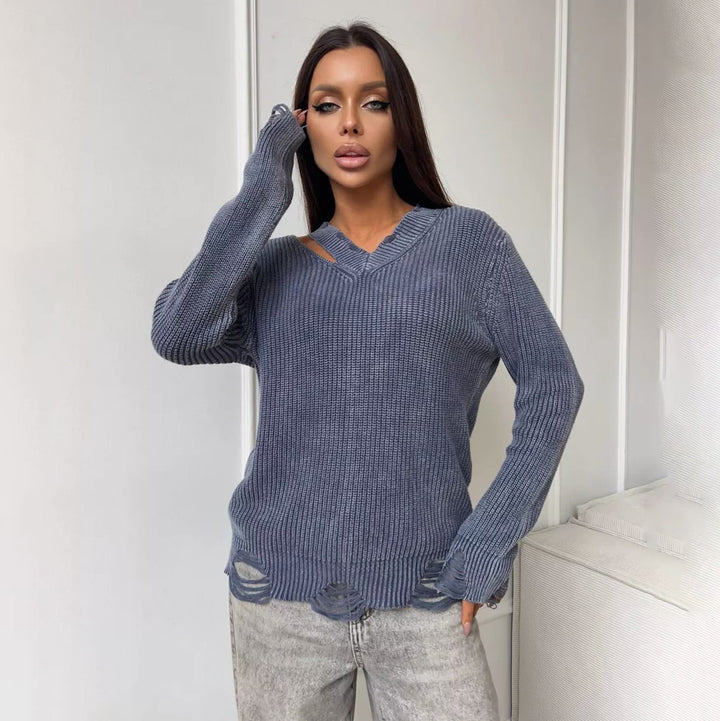 Thick knitted sweater for women with a trendy V-neck and worn elements Lune London