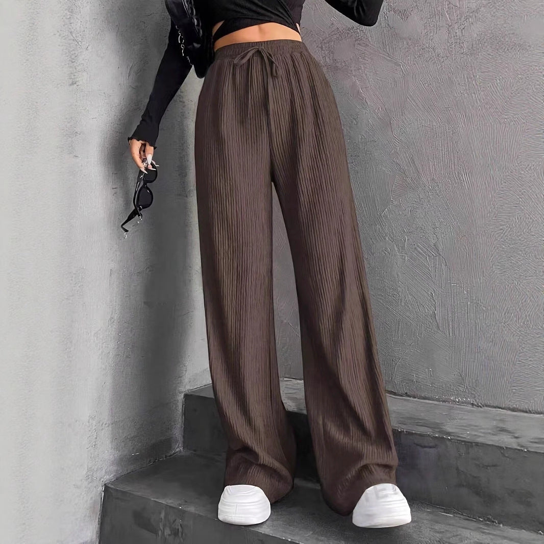 Wide pleated pants for women with elastic waistband and practical pockets Lune London