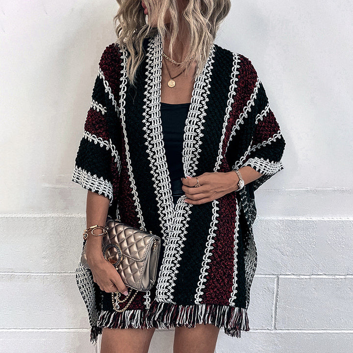 Knit poncho for women with V-neck and fringes Lune London