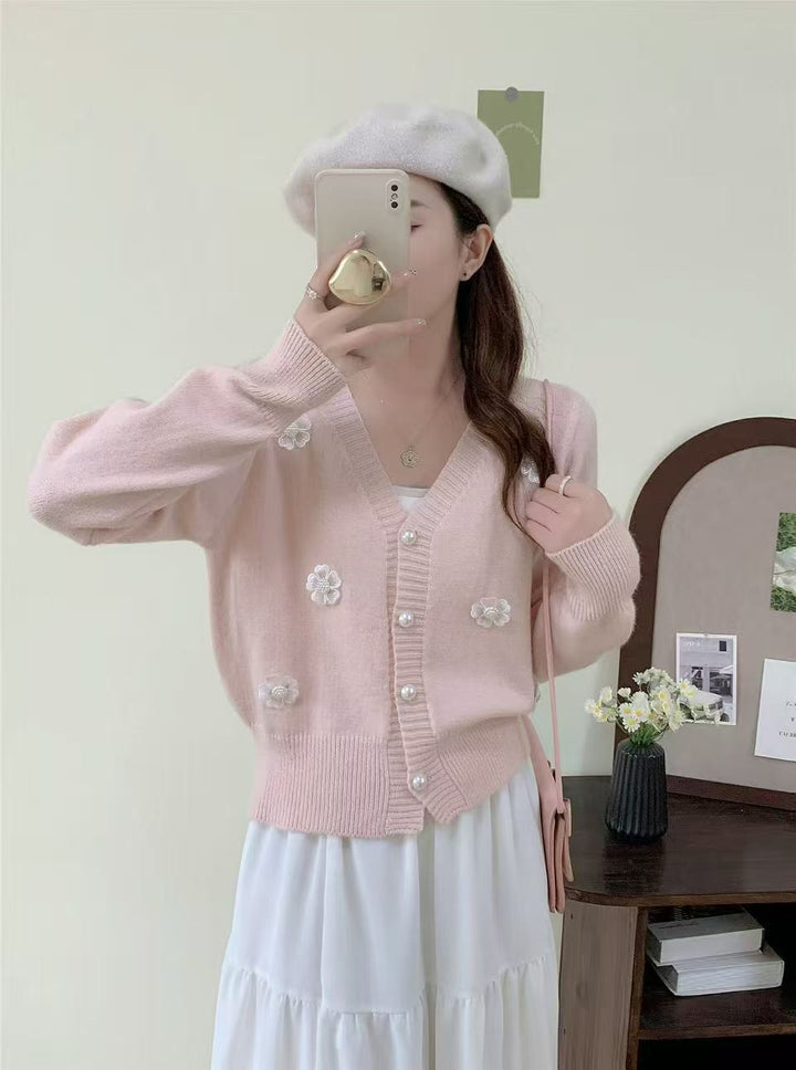 Ladies cozy knit vest with flower embroidery and pearl buttons Lune London