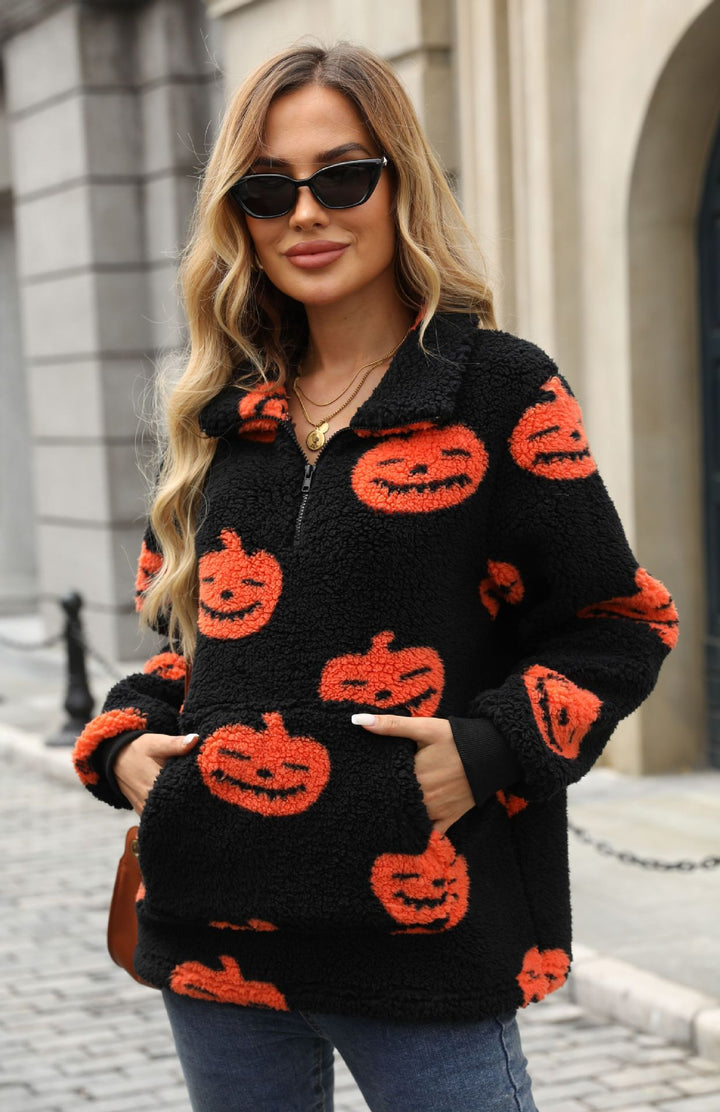 Women’s plush sweater with Halloween pattern and handy pockets Lune London