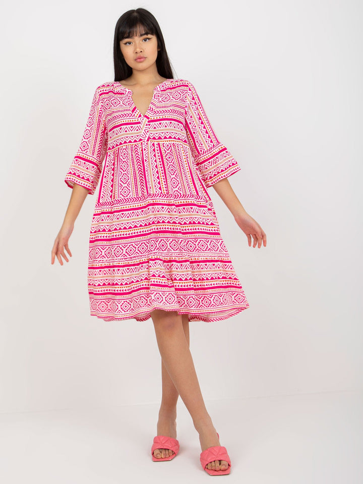 Shirt dress for women with voluminous ruffled sleeves and a playful floral pattern Lune London