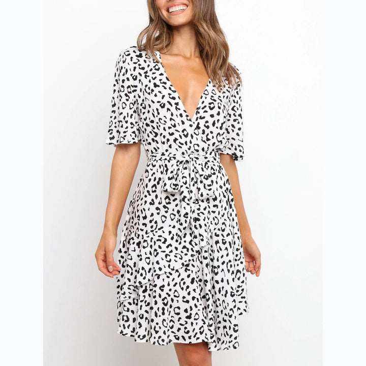 Women's wrap dress with generous ruffle sleeves and beautiful animal print Lune London